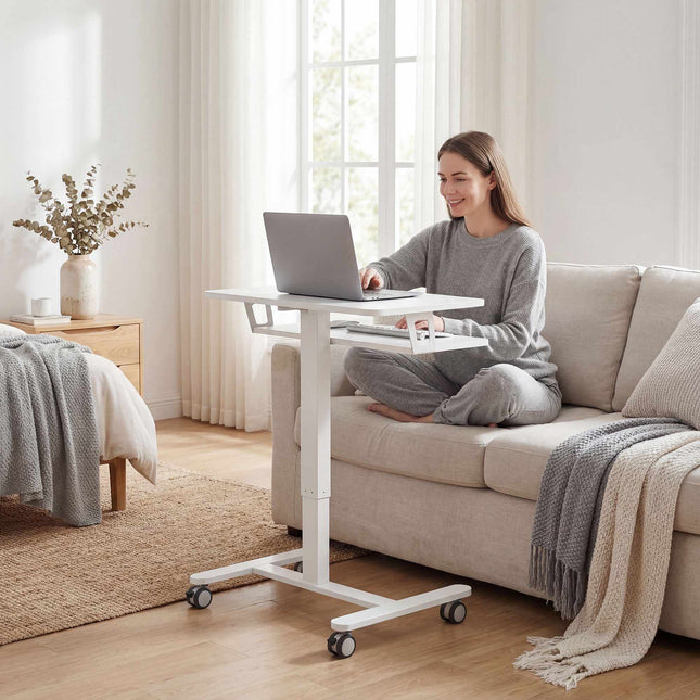 Rollbarer Steh-Sitz-Schreibtisch mit Tastaturablage, weiß