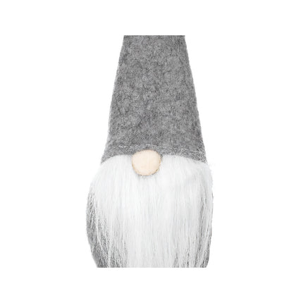 Un gnome gris debout