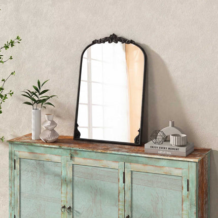 Miroir mural arqué avec cadre baroque doré orné