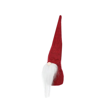 Un gnome rouge debout