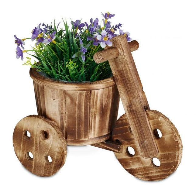 Vélo avec des fleurs en bois