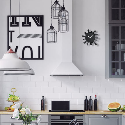 Horloge murale noire, design unique en forme d'éclaboussure