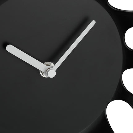 Horloge murale noire, design unique en forme d'éclaboussure