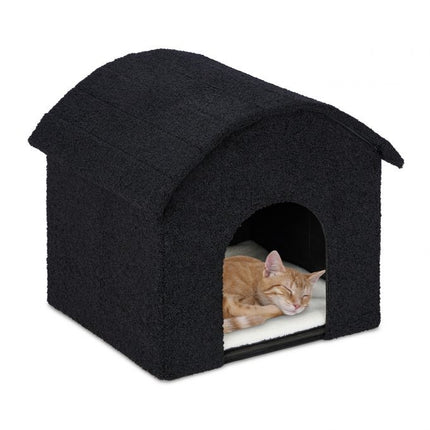 Schwarzes Katzenfell mit Kratzfläche