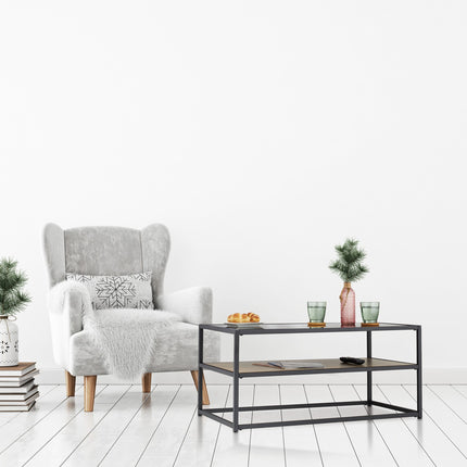Table basse noire avec plateau en verre