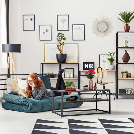 Table basse noire avec plateau en verre