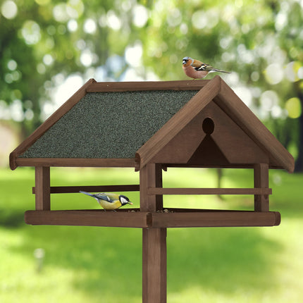 Table à oiseaux marron sur poteau