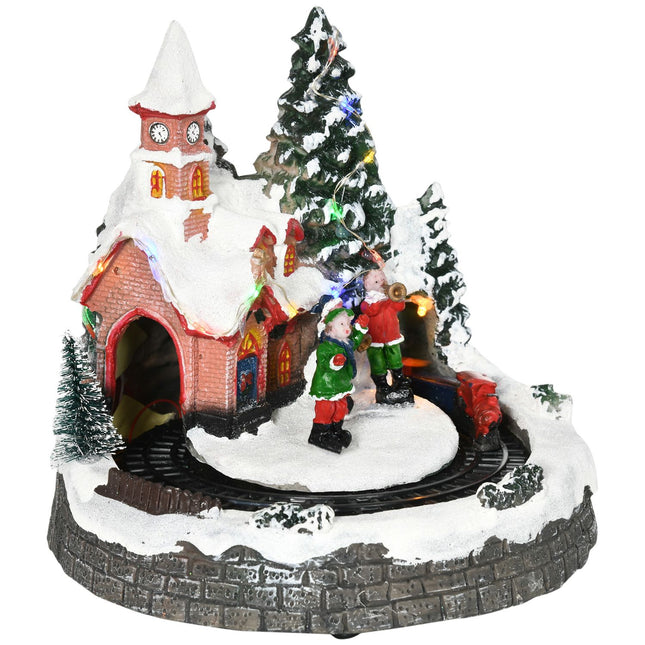 Weihnachtsdorf mit LED-Beleuchtung und fahrendem Zug