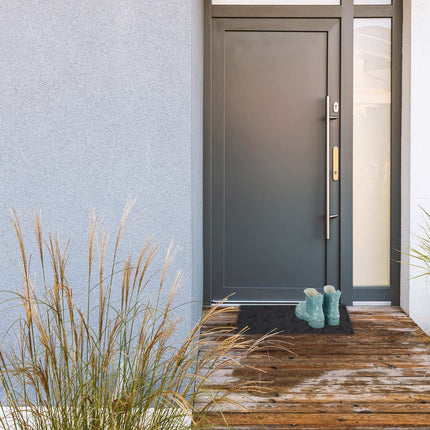 Tapis de porte en caoutchouc motif empreinte de pas