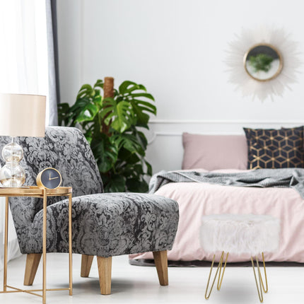 Tabouret en fausse fourrure blanc-doré