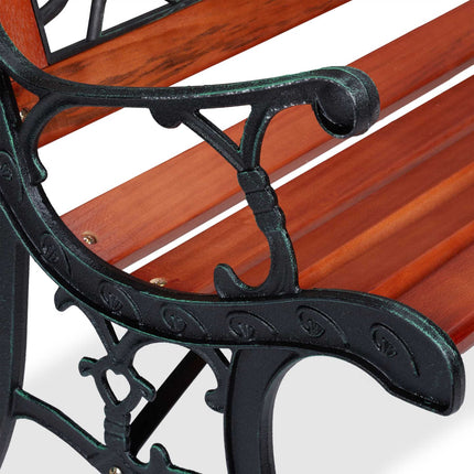 Banc de jardin avec rosiers marron foncé
