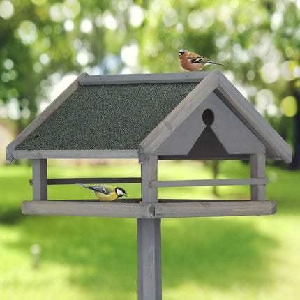 Table à oiseaux grise sur poteau