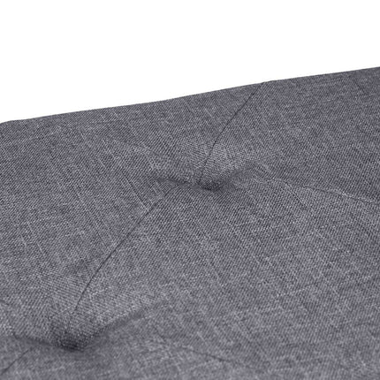 Grauer Hocker mit Stauraum