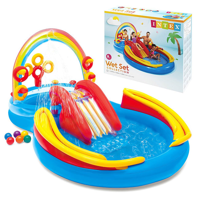 Aire de jeux aquatiques gonflable arc-en-ciel avec toboggan et fontaine