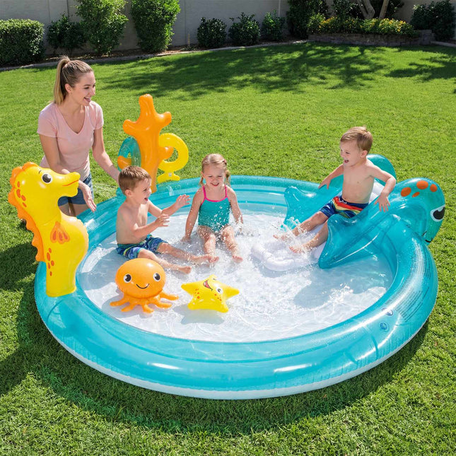 Parc aquatique gonflable pour enfants avec toboggan et arroseur