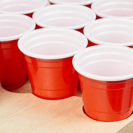 Mini Beer Pong avec des gobelets rouges