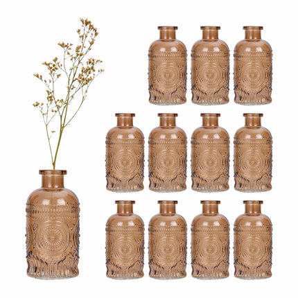 Ensemble de 12 petits vases en verre à motif en relief