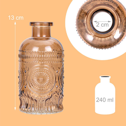 Ensemble de 12 petits vases en verre à motif en relief