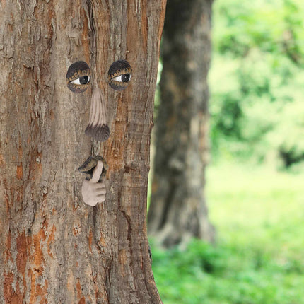 Visage en bois avec un geste de repos