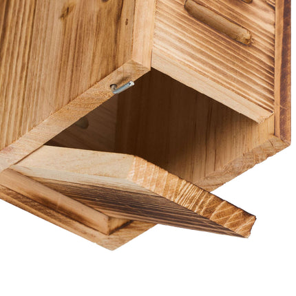 Maison de coccinelle en bois